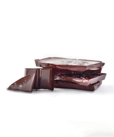 Vertical stack of Sea Salt Gourmet Dark Chocolate Bar with two pieces facing the front