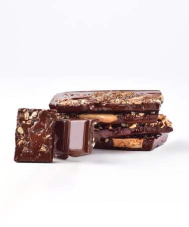 Vertical stack of Gourmet Dark Chocolate Bar with Toffee with two pieces facing the front