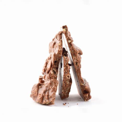 4 pieces of gourmet Peanut ButterBark standing on their ends to form a pyramid shape