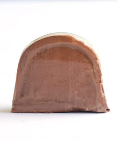 Inside view of a gourmet truffle that contains salted caramel