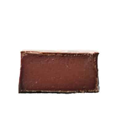Inside view of a gourmet truffle that contains a contains raspberry caramel