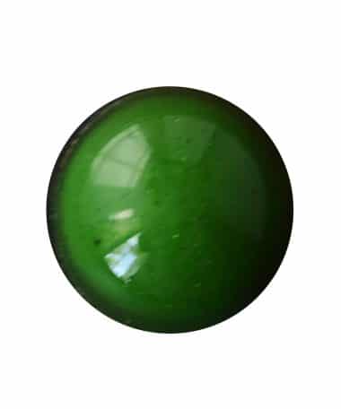 Overhead view of a deep green gourmet chocolate truffle that contains a cookie crust topped with cinnamon apple caramel ganache