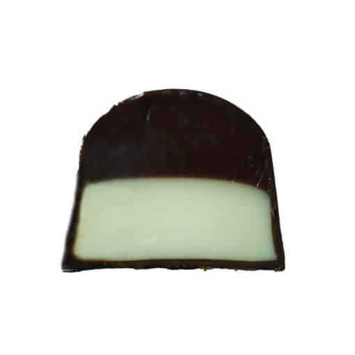 Inside view of a gourmet truffle that contains a layer of mascarpone ganache on top of a layer of coffee ganache
