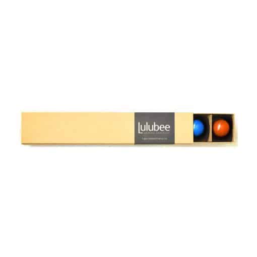 A kraft-colored box with a cigar band containing the Lulubee brand; box is open to reveal some bonbons