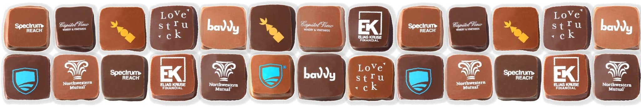 Two rows of gourmet chocolate bonbons with different company logos on them