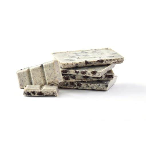 Vertical stack of Cookies and Cream Gourmet Chocolate Bar with two pieces facing the front