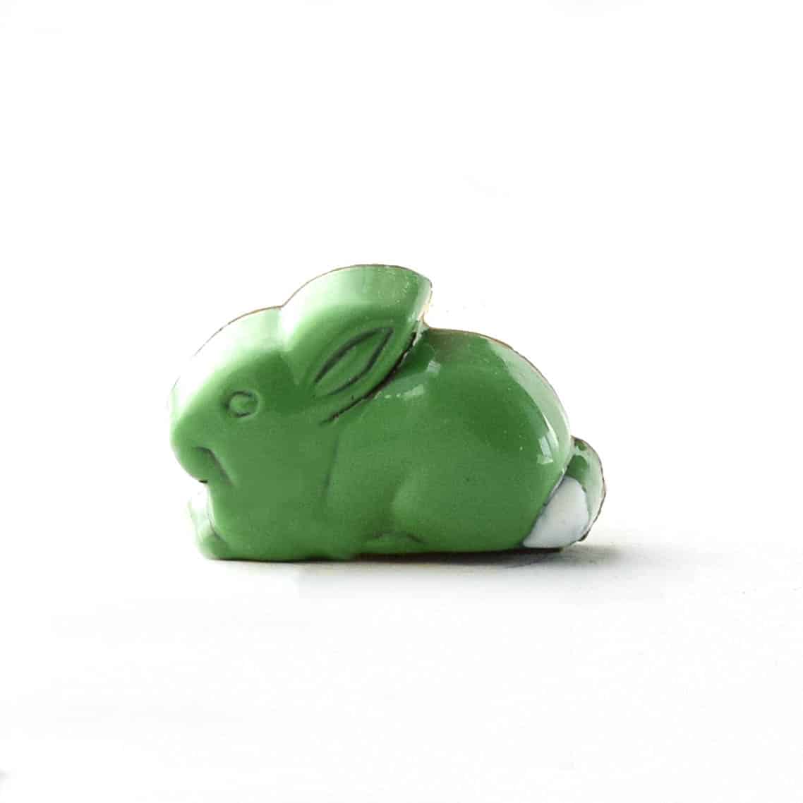 Side view of a spring green, rabbit-shaped gourmet chocolate truffle filled with handcrafted marshmallow