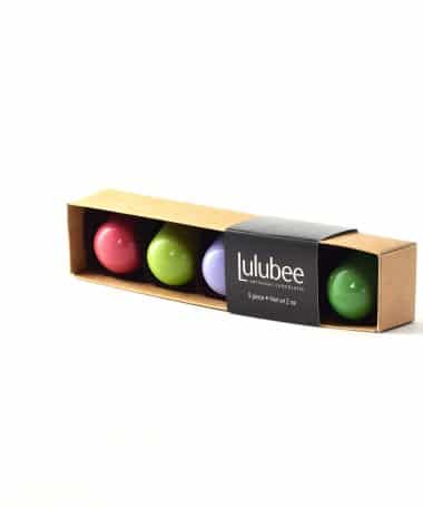 Box of 5 gourmet chocolate truffles in bright spring colors; box has a cigar band that contains the Lulubee logo
