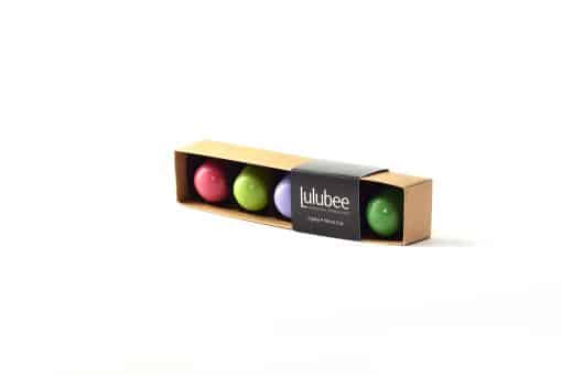Box of 5 gourmet chocolate truffles in bright spring colors; box has a cigar band that contains the Lulubee logo