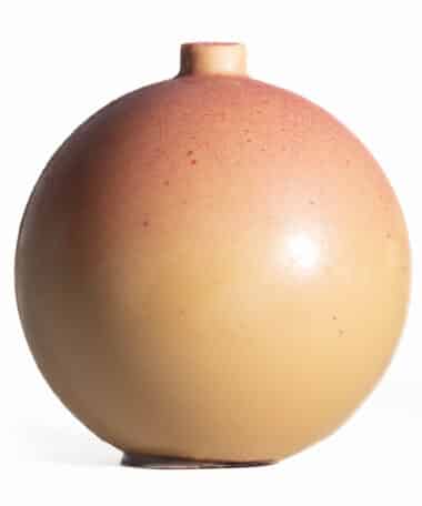 Cozy up with this ornament-shaped Salted Caramel Cocoa Bomb.