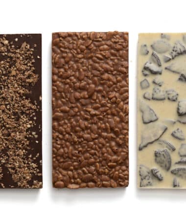 Our Chocolate Lovers Sampler contains three bars in milk, dark, and white chocolates: English Toffee Dark Chocolate Bar, Crisped Rice Milk Chocolate Bar, Cookies and Cream White Chocolate Bar